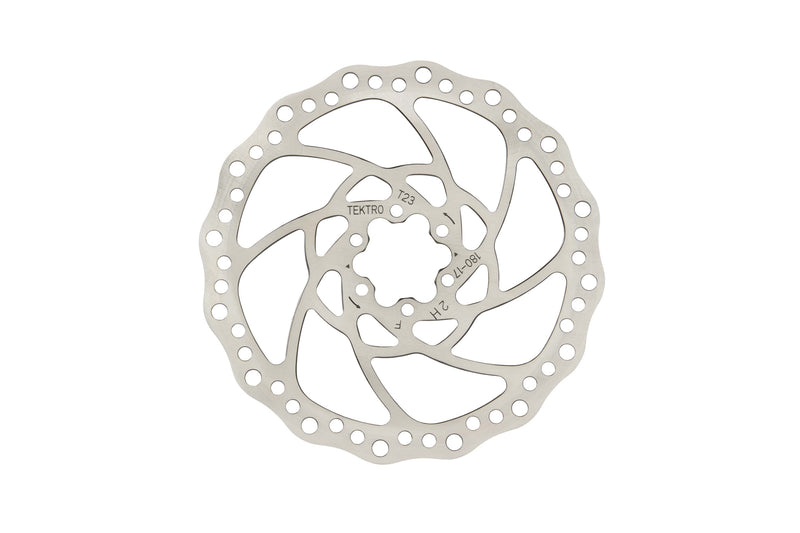 Tektro brake rotor, a circular metal design with Tektro and numbers engraved on it.